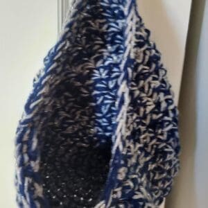 Blue and white crocheted hanging pouch
